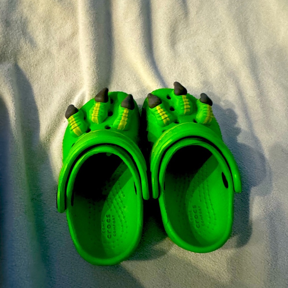 Monster/ Dinosaur crocs size 4c